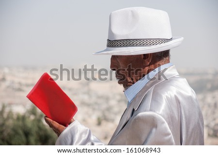 JERUSALEM - OCT 31: Ethiopian Jewish man prays at the Sigd - Oct. 31, 2013 in Jerusalem, Israel. The Sigd is an annual holy day of the Ethiopian Jews.