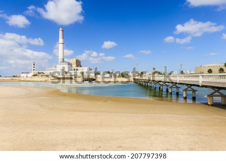 The Wauchope Bridge (over the mouth of the Yarkon stream), Reading Power Station and the lighthouse. Tel Aviv, Israel