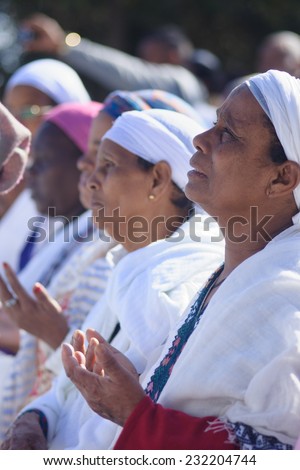 JERUSALEM - NOV 20, 2014: Ethiopian Jewish women pray at the Sigd, in Jerusalem, Israel. The Sigd is an annual holiday of the Ethiopian Jews