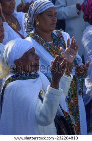 JERUSALEM - NOV 20, 2014: Ethiopian Jewish women pray at the Sigd, in Jerusalem, Israel. The Sigd is an annual holiday of the Ethiopian Jews