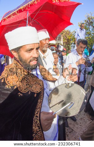 JERUSALEM - NOV 20, 2014: A Kes, religious leader of the Ethiopian Jews, plays a drum to mark the end of the Sigd prays, in Jerusalem, Israel. The Sigd is an annual holiday of the Ethiopian Jews