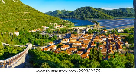 Panoramic view of the village of Ston, the walls and the salt pools, in Dalmatia, Croatia