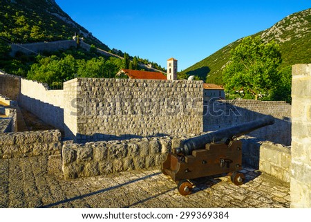 An old gun on the old walls in the village of Ston, in Dalmatia, Croatia
