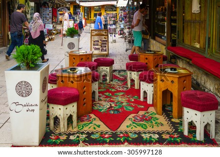 SARAJEVO, BIH - JULY 04, 2015: Typical street and bazar scene, with local businesses, locals and tourists, in Sarajevo, Bosnia and Herzegovina