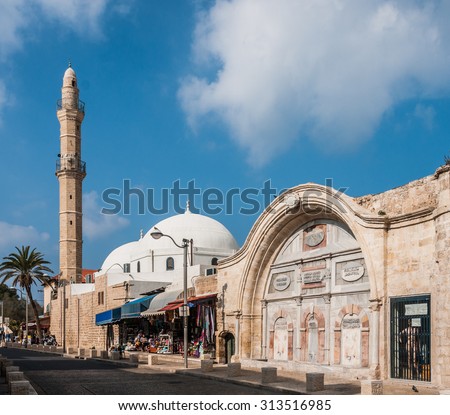 TEL AVIV, ISRAEL - JANUARY 17, 2014: The Mahmoudiya Mosque in Jaffa, with local businesses, locals and tourists, in Tel Aviv, Israel