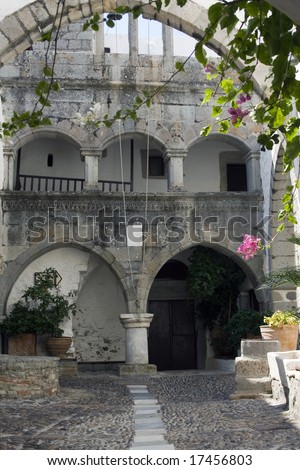 Gothic arches in main courtyards of the Monastery St. John, Patmos Island. Dodecanese Island,Greece.  UNESCO World Heritage Site