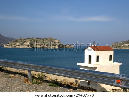 Typical greek small road shrine - Crete. In front of Spinalonga island. View from Elounda - Greece