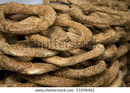 Koulouri - Greek snack a circular Greek bread with sesame seeds. Often sold by street vendors.  They are similar to Turkish bread \
