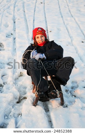 girl on sledge