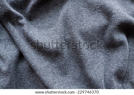 Grey creased fabric background or texture