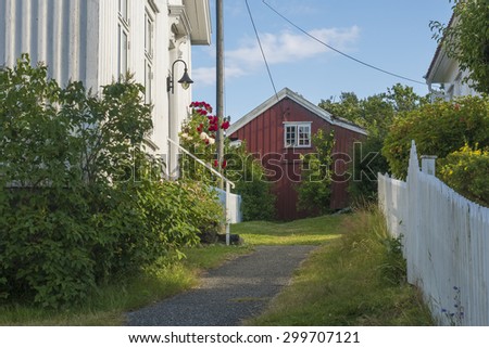 ARENDAL, NORWAY - July 14, 2015: Traditional houses on Merdoe Island outside Arendal, Norway on July 14, 2015.