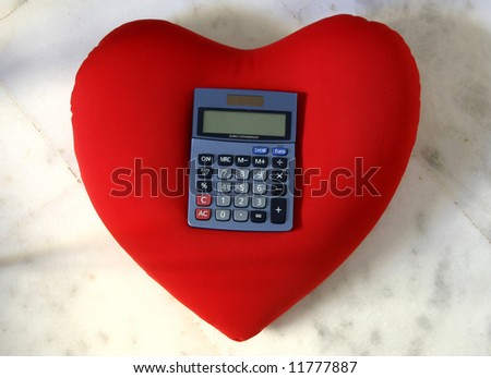 Calculator on heart. Concept: we can work it out