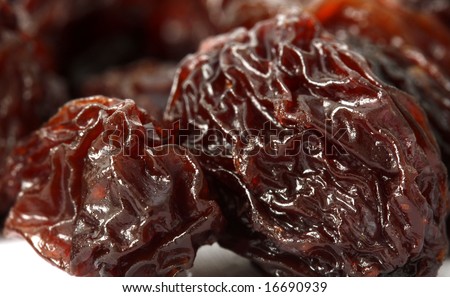 stock-photo-close-up-of-two-large-raisins-16690939.jpg
