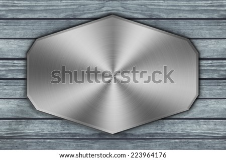 metal aluminum plaque on wood background