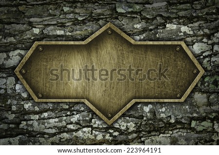 Brass plate on bark background for text