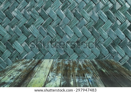 basketry wood background with empty wooden deck table ready for product display montage. vintage color concepts
