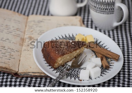 Tea cake with old handwritten recipe book