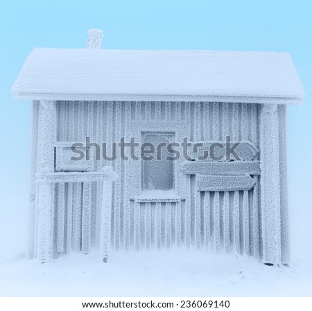 Hut completely covered in frost. Finnish Lapland.