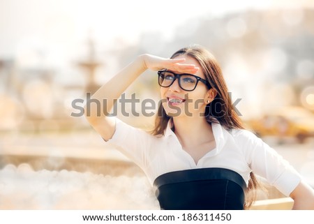 Young Woman with Glasses Searching - Young woman with glasses searching for something