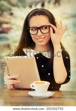 Young Woman with Glasses and Tablet Having Coffee - Beautiful woman with glasses on a coffee break with her tablet