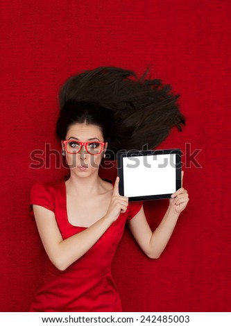 Surprised Woman Wearing Glasses Holding Tablet - Beautiful amazed woman in red decor holding a tablet PC