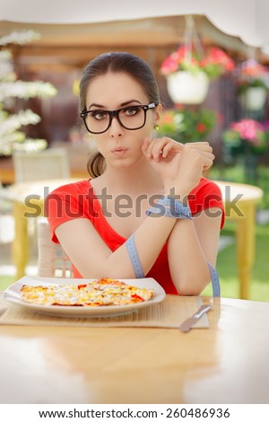 Surprised Woman with Hands Tied with Measure Tape - Beautiful girl on diet trying to eat a pizza