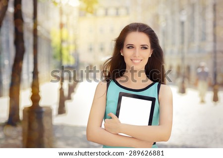 Woman with Pc Tablet Out in the City - Portrait of a businesswoman holding a tablet