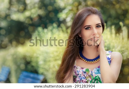 Smiling Woman Wearing Floral Dress and Big Necklace - Fashion girl accessorized with metal and wool handmade statement necklace