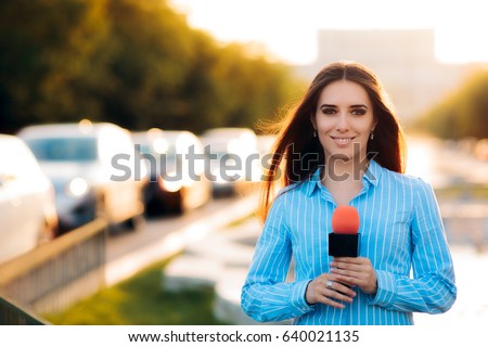 Female News Reporter on Field in Traffic - Woman journalist on the job as a live correspondent