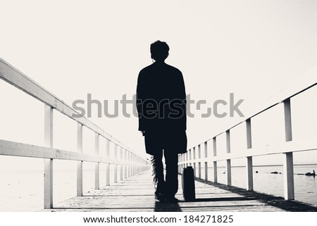 man on the pier ,abstract landscape,waiting for work ,on the trip ,man  silhouette unusual,lonely concept