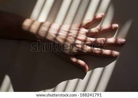 hand in the shadow