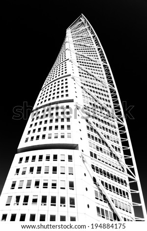 MALMO, SWEDEN - May 26: Turning Torso skyscraper on May 26, 2014 in Malmo, Sweden. Designed by Santiago Calatrava, it is the most recognized landmark of Malmo today.black and white