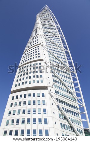 MALMO, SWEDEN - May 26: Turning Torso skyscraper on May 26, 2014 in Malmo, Sweden. Designed by Santiago Calatrava, it is the most recognized landmark of Malmo today.