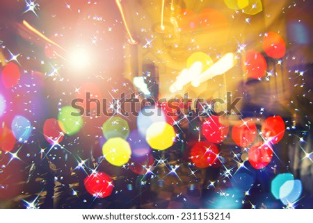 colorful crowd on concert,disco night ,dancing concept,party and night club background