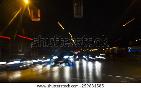 car lights on highway by night,abstract light trace background