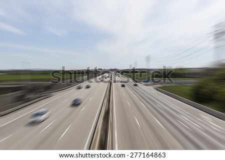heavy traffic on highway ,fast cars traveling on the highway ,abstract speed transportation  background