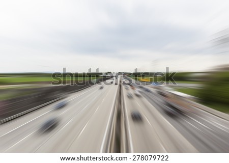 heavy traffic on highway ,fast cars traveling on the highway ,abstract speed transportation background