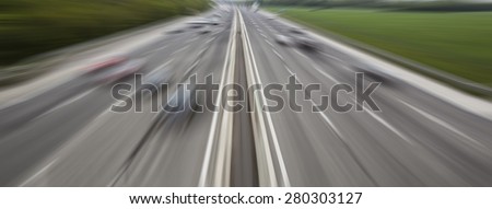 traffic on highway ,fast cars traveling on the highway ,abstract speed transportation background