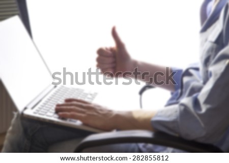 business woman hands busy using laptop at office desk,woman typing on the laptop ,office space ,blurred office background