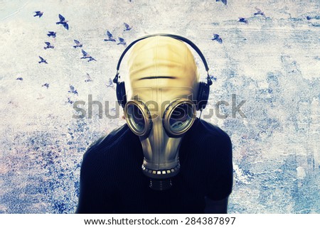 man with gas mask and headphones, grunge background,dj star party background,