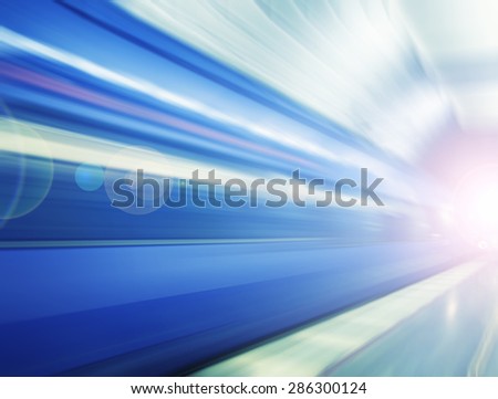 fast train passing by,motion blur ,colorful train in the tunnel, abstract transportation background