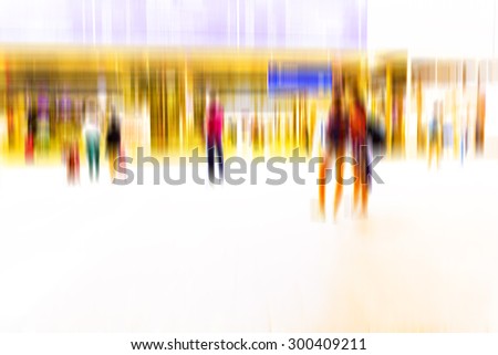 people walking in metro station,  blurred motion,travelers on train station,vacation time,rush hour in the city