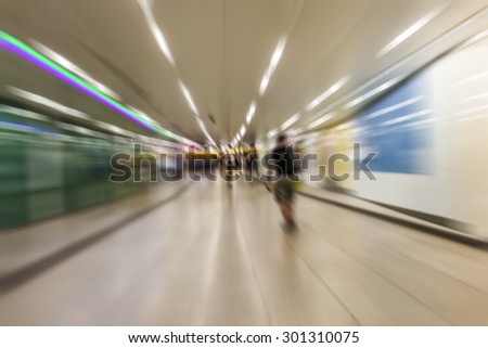 Busy crowd of people walking in metro station, Business People Walking on the Street, blurred motion