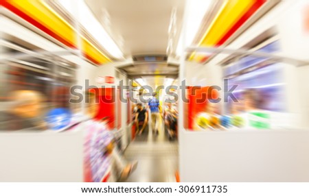 people on subway train , metro train  in rush hour ,blurred background