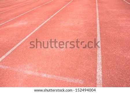 old run track and white line pattern surface