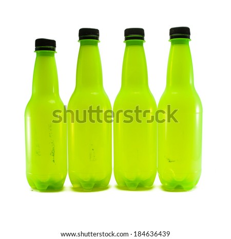 lot of bright old dirt green plastic bottle isolated on white background