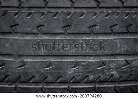 old pile of a worn out car tires pattern background
