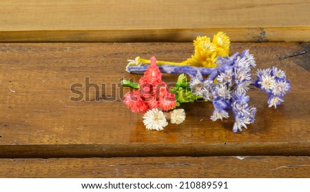 colorful floral flower decoration on wood surface table