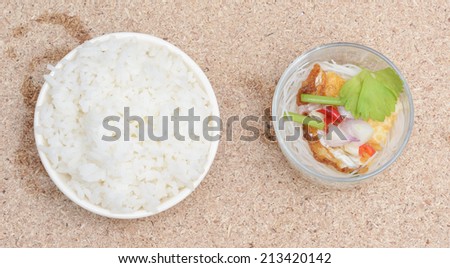 top view white rice and fried Egg Salad pepper food at wooden table background
