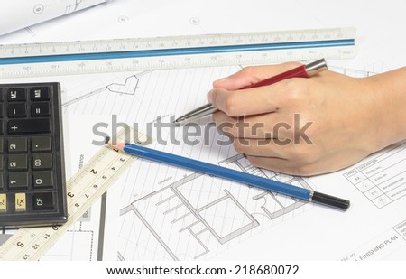 woman hand work  interior plan with office object for business concepts